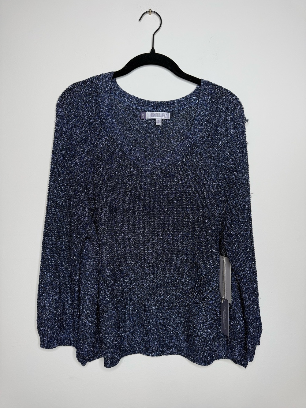 Jennifer Lopez Metallic Blue sweater with side Detail cutouts